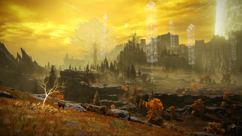 A sheep grazes under a shining sapling on a hill overlooking the plateau. The walls of the Capital curve into the distance, and layers of cliffs rise up in the space between. A large golden Erdtree dominates the skyline, and beyond, the silhouettes of a trio of windmills.
