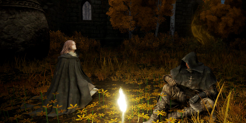 Melina, a pale woman in a grey cloak, tilts her head back as she recites tales of Marika to Gille, sitting beside a grace in a patch of yellow flowers.