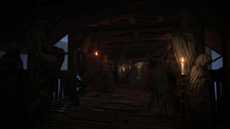 A wooden walkway in the shaded castle, full of intricately-carved stone figures.