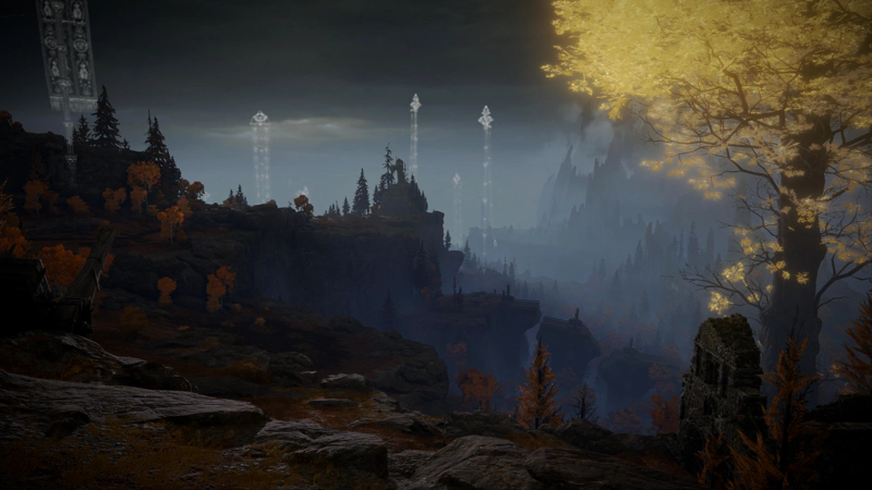 A view across the Altus Plateau at night. Spectral banners stand white against the pale blues of darkness, and to the right, the jagged slopes of the volcano rise from the mist.