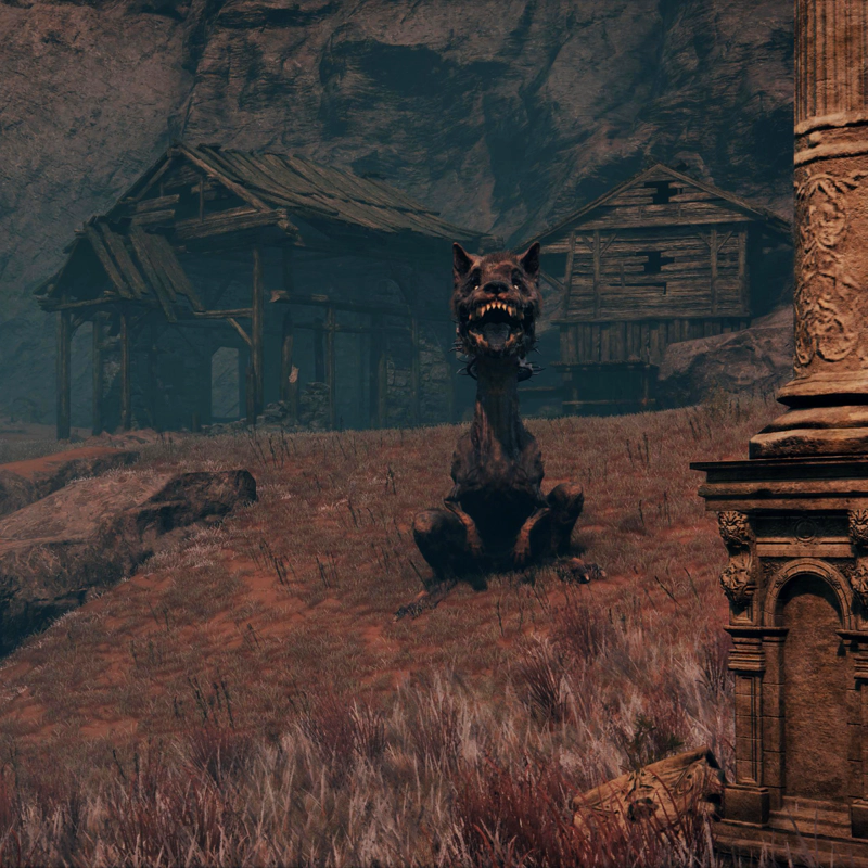 A monstrous dog sits in front of a broken-down wooden shack, at the top of a gentle slope covered in pink-grey grass. The dog is on its haunches, mouth hanging open.