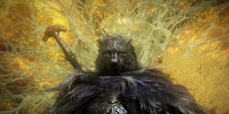 A humanoid grey wolf called Blaidd, with a grey fur cloak over his armour and a large sword over his shoulder, standing in front of the glorious golden branches of the Erdtree.