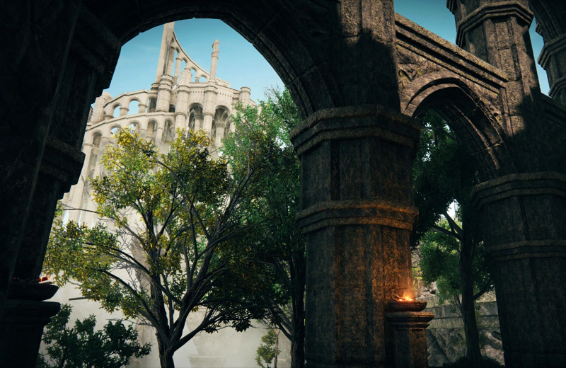 A view through a pointed grey-stone archway, past sunlit green trees towards a spiralling city of gleaming white stone in the sky above. A second arch to one side leads only to foliage, and a lit brazier on a stone pedestal stands between them.