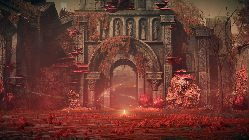 A shard of Grace glows golden at the heart of the Temple of Rot. The floor is scattered with sickly pink growths, and the stone facade beyond is encrusted with coral-like masses. A large ceremonial archway is partially choked with grey-pink vines, and in the distance, a set of stairs leads upwards to a dais.