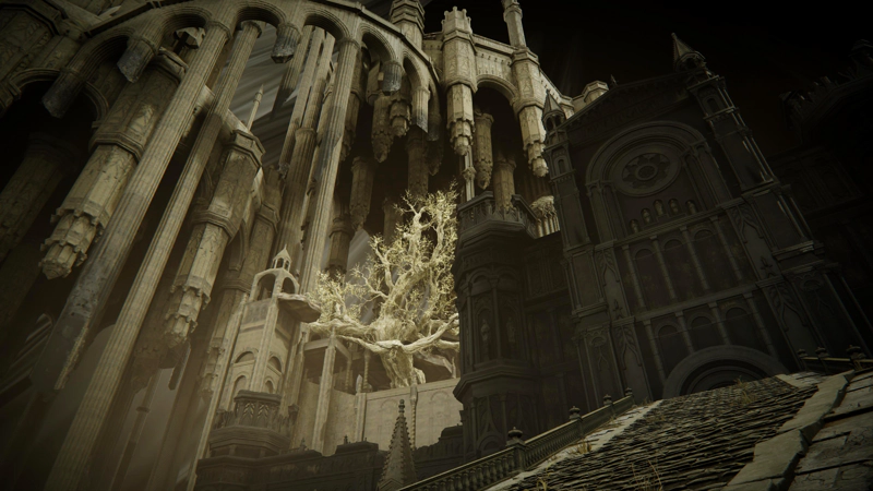 A cathedral of pale grey stone stands in shadow at the top of a wide stairway. Above, the ornate carvings of the building pale to insignificance beneath the spiralling city which shines overhead. There is a large tree with many thick branches up in the city, its trunk the same sun-drenched grey as the city itself, and its leaves a scattering of plae gold.