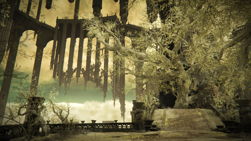 A plaza in the city gardens, where trees reach out with thickened branches and thin golden foliage. A pathway leads onwards, past spiral-pattern stone columns spaced at regular intervals. To the left, the gardens drop away to reveal higher spiralling pathways and their unearthly dangling pillars against a sky of greenish-blue and pale gold.
