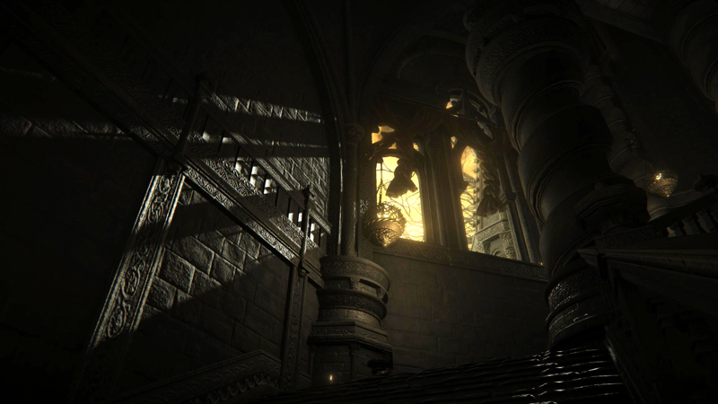 A wide spiral staircase of grey stone and thick spiralling columns, leading up past a pair of arched windows. The evening sun is shining through, painting the left-hand wall in glorious light. A golden sconce hangs from a fixing at the top of the current set of stairs, gleaming in the light, and the stairs continue round to the right.