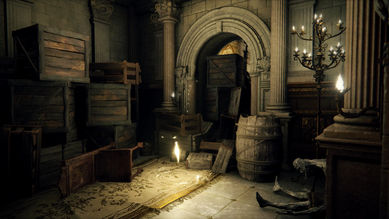 A shard of grace in a small, ornate room cluttered with wooden boxes, barrels and a fallen chair. Some of the boxes are blocking a detailed archway, and a shrivelled corpse is leaning against a wall.