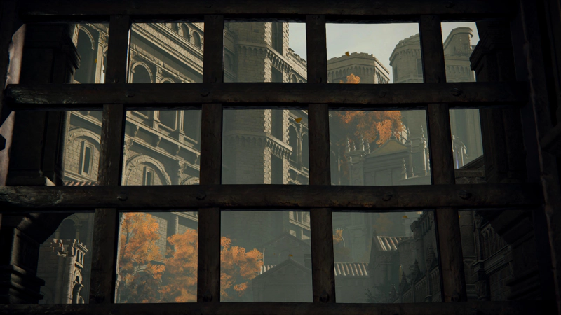 A view through an iron grating up towards the sunlit Capital walls rising above, and scattered golden foliage.