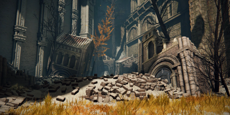 A sunlit pile of rubble, amidst a gaggle of skewed stone buildings. A golden tree rises at an oblique angle beside of the buildings.