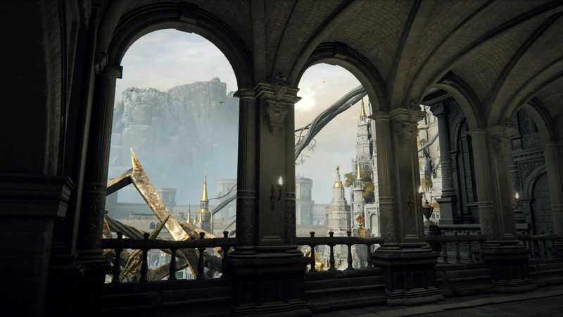 A row of archways in the side of a walkway, looking out over the golden spires and arcing tree roots of the Capital. In the distance, snow-topped cliffs rise high above the city walls.