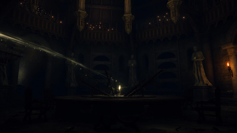 A shard of golden grace at the centre of a large table, in a dimly-lit room full of statues. The shard is surrounded by broken and rusted weaponry, piercing the table.