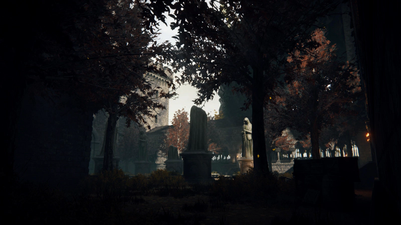 A courtyard full of hooded statues at sunset. Foliage is silhouetted black against the sky.