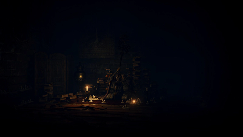 A pair of skeletal female figures, clad in ragged robes and lit by nearby candles. Together, they hold up a staff topped with jangling coins.