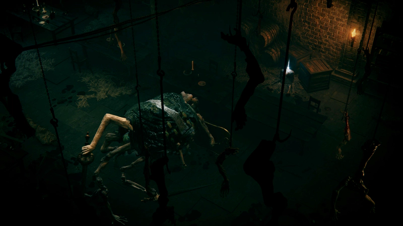 A construct of grafted limbs stalks across a dark room. Amputated limbs are silhouetted in the foreground, dangling on hooks.