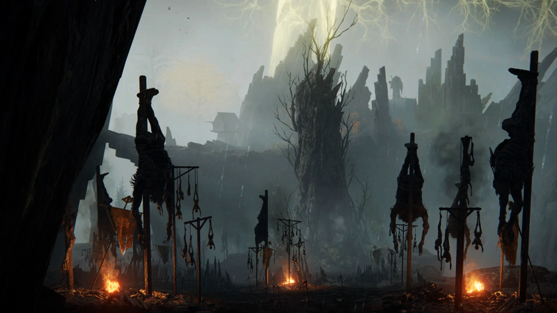 A view across a burning hillside towards a giant ruined tree. The slopes are covered with posts bedecked with hanging corpses, including a number of giant bodies.