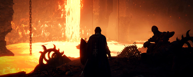 A Confessor stands silhouetted against a radiant lava field, surrounded by broken automatons and half-melted iron cages. A lava-fall glows bright as it crashes down from above.