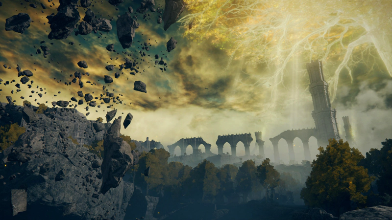 A view across Limgrave, towards a broken viaduct and a vast tower. In the foreground, a cataclysm of shattered rock has erupted into the air and now floats lazily in the sky, opening the way below.