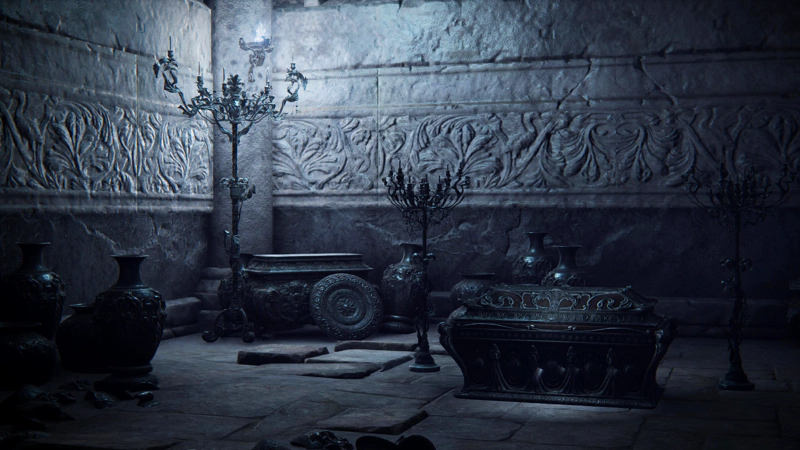 A ceremonial chamber with flowing floral patterns carved into the walls. A scattering of narrow-necked jugs and ornate candlesticks accompany a pair of ornate ark-like chests.