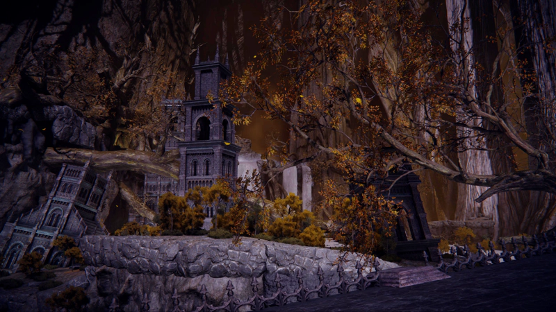 A chaotic ruined city, grey buildings rising and falling from a background of brown rock and scattered golden foliage.