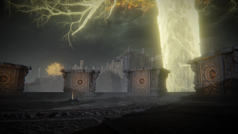 The top of the Carian divine tower, a circular open space with a corpse at its centre. Unlike the other towers, the corpse isn't one of the Two Fingers, but a single human, their body black with burns. A wisp of pale orange rises from the body, beneath the golden branches of the Erdtree above.