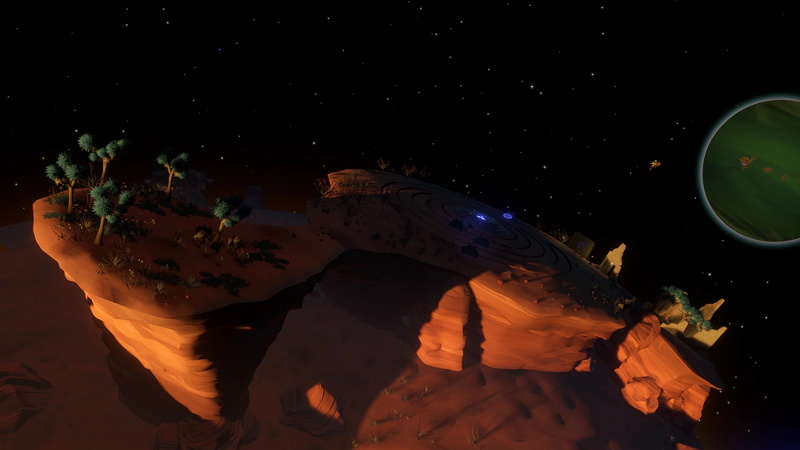 A dusty two-lobed plateau of red rock. There's a copse of scrubby trees on the left-hand lobe, and an alien installation of glowing blue symbols on the right-hand lobe, along with a cluster of ruined buildings.